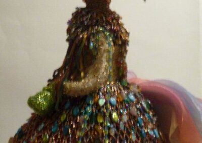 “Twiggy”. Beads, insects & dyed fabrics, inspired by Autumn. Height 18”. £300.